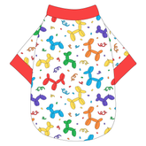 Tee shirt in a dog friendly pattern that shows party images like balloons and confetti. It's complete with solid red trim on the neck, waist and sleeves.